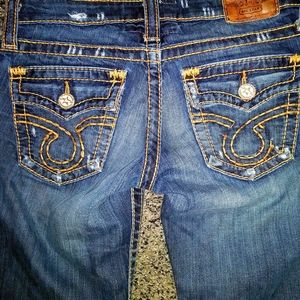 Two pair of jeans One True Religion and one pair o